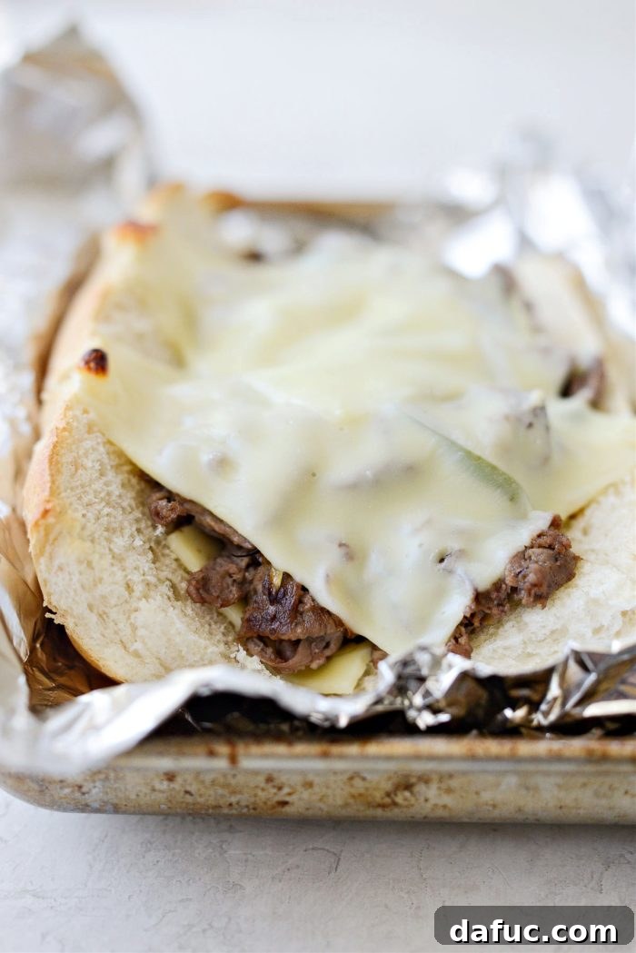 Melty, Meaty Philly Cheesesteak Magic 16 melted cheese on steak sandwiches