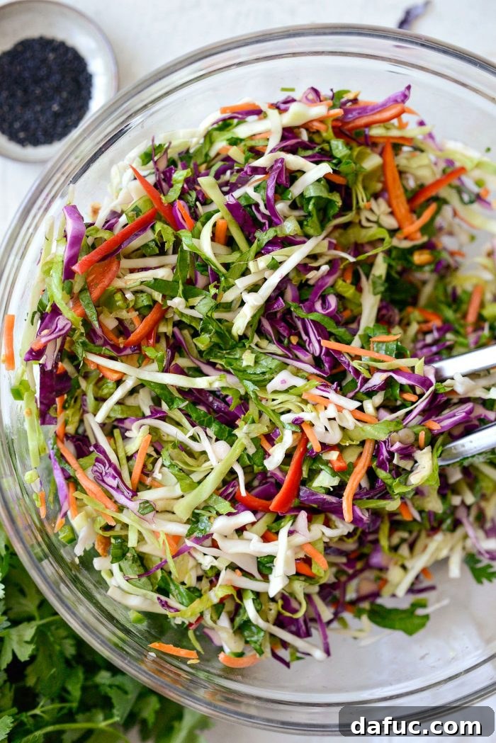 Asian Crunch Salad with Basil-Ginger Zing 11 Tossing the Asian Cabbage Slaw with dressing
