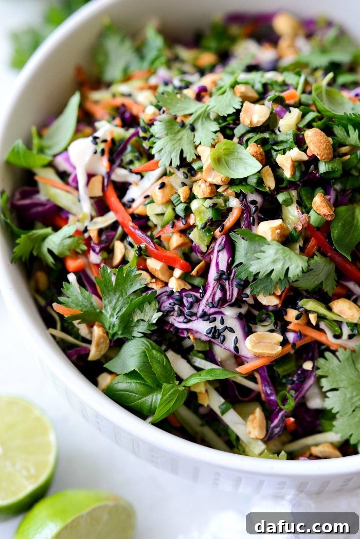 Asian Crunch Salad with Basil-Ginger Zing 14 Asian Cabbage Slaw with Basil Ginger Dressing served in a bowl