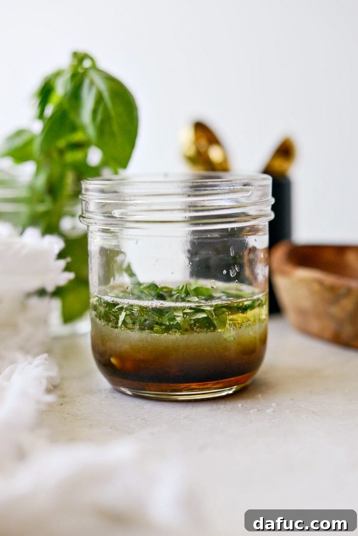 Asian Crunch Salad with Basil-Ginger Zing 6 Dressing ingredients measured and added to a jar for mixing