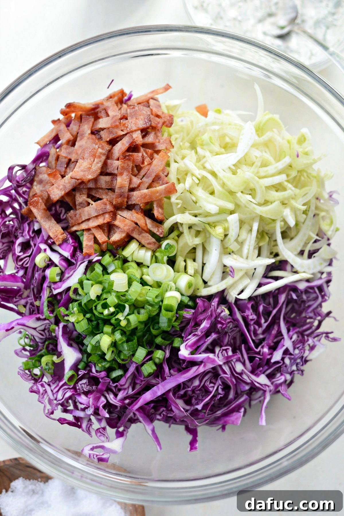 slaw ingredients in mixing bowl