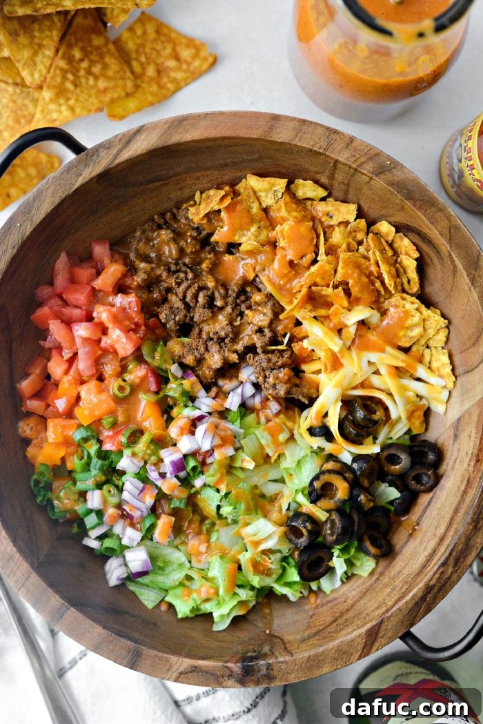 Loaded Chopped Taco Salad 9 Chopped taco salad with homemade Catalina dressing drizzled over it.