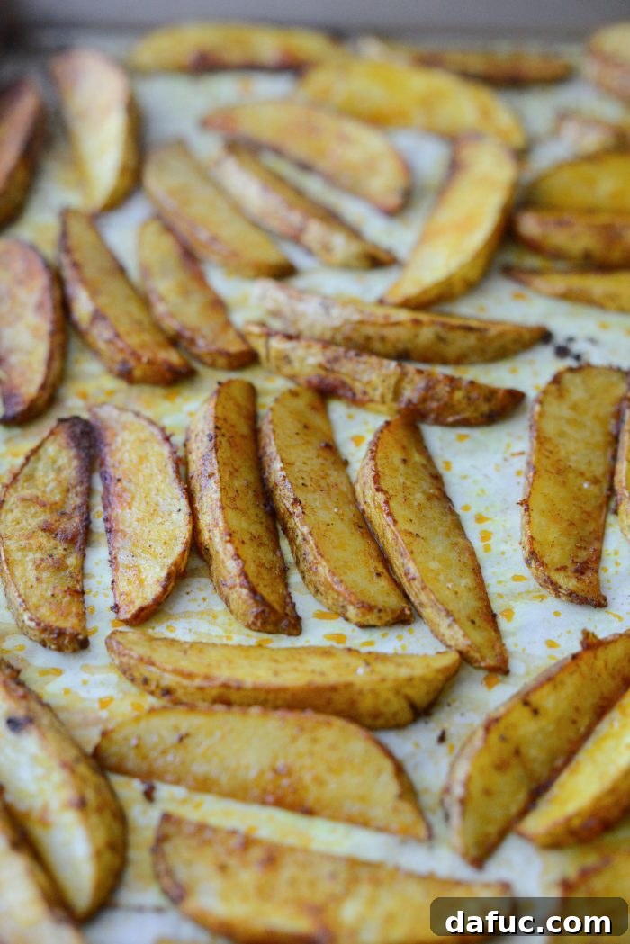 Crispy Seasoned Steak Fries 11 Crispy steak fries after baking for 25 minutes, showing golden brown edges