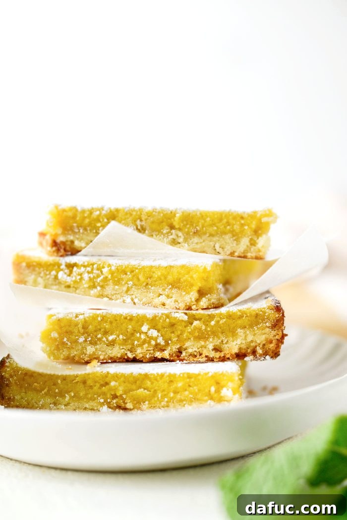 Lemongrass and Coconut Shortbread Bars 2 Lemongrass Bars with Coconut Shortbread Crust - a perfectly sliced square dusted with powdered sugar