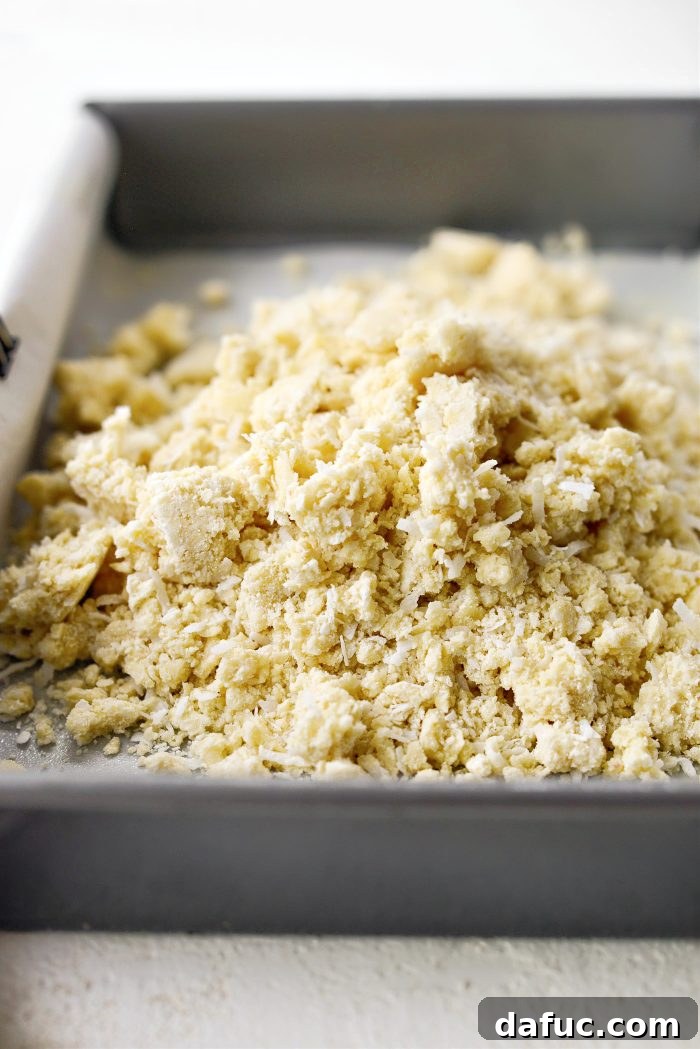 Lemongrass and Coconut Shortbread Bars 10 Transfer crumbly dough to prepared pan for Coconut Shortbread Crust