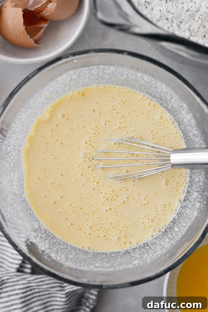 Whisking wet ingredients for pancake batter
