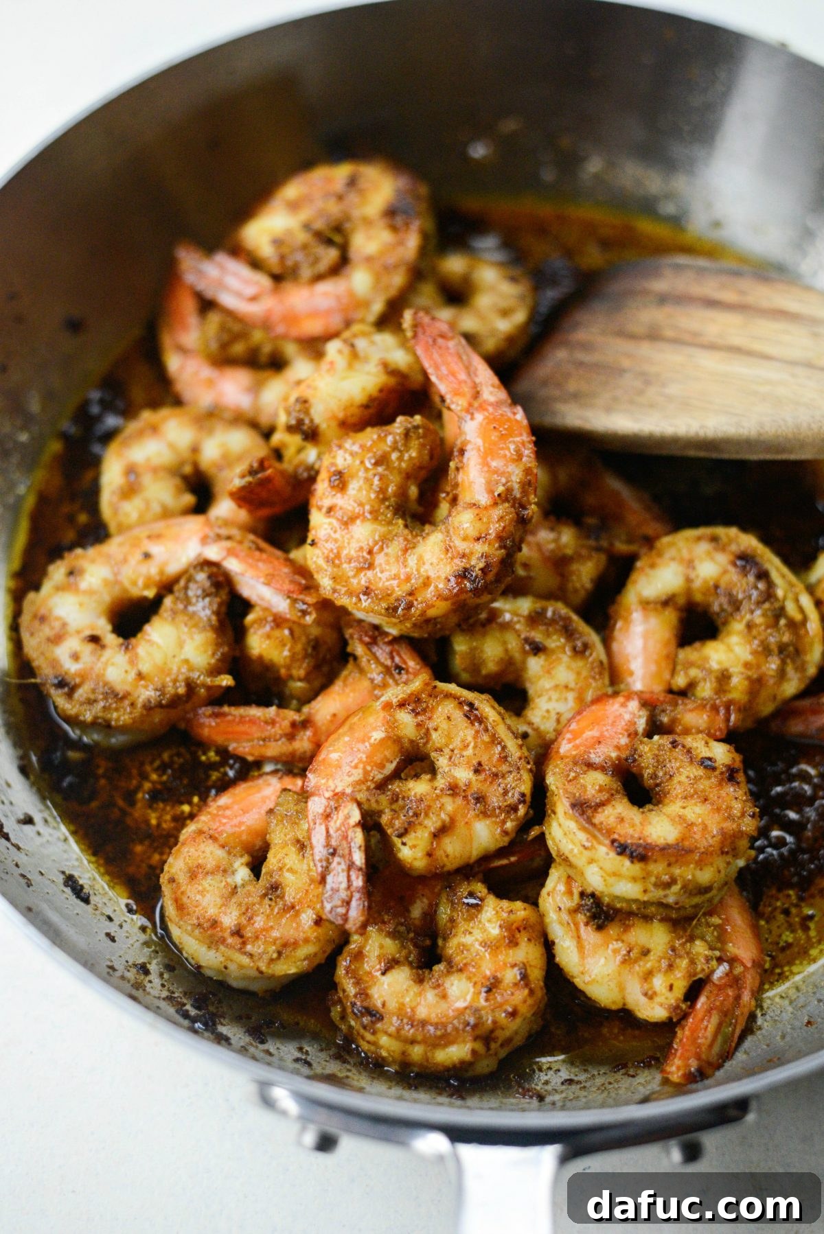 Aromatic North African Shrimp with Vibrant Summer Couscous 14 Deglazing the pan with lemon juice after cooking shrimp.
