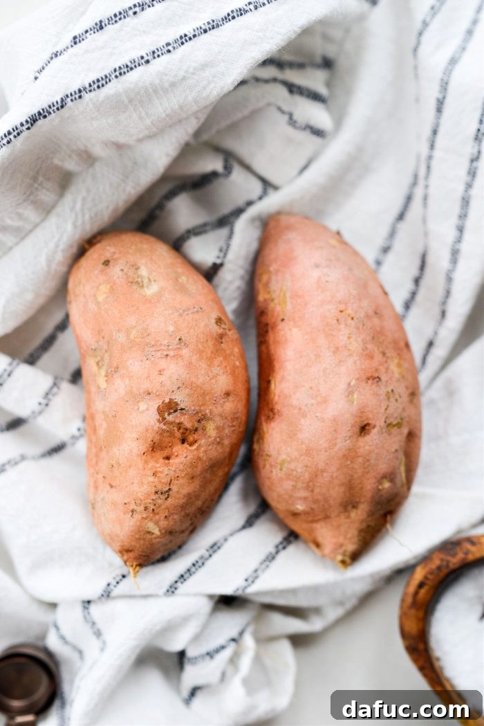 Medium-sized sweet potatoes, cleaned and ready for slicing into fries