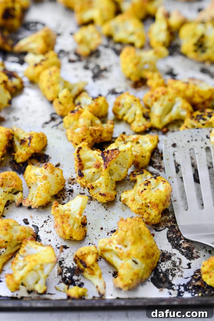 Golden Curry Roasted Cauliflower 11 Curried cauliflower after roasting, golden and crispy