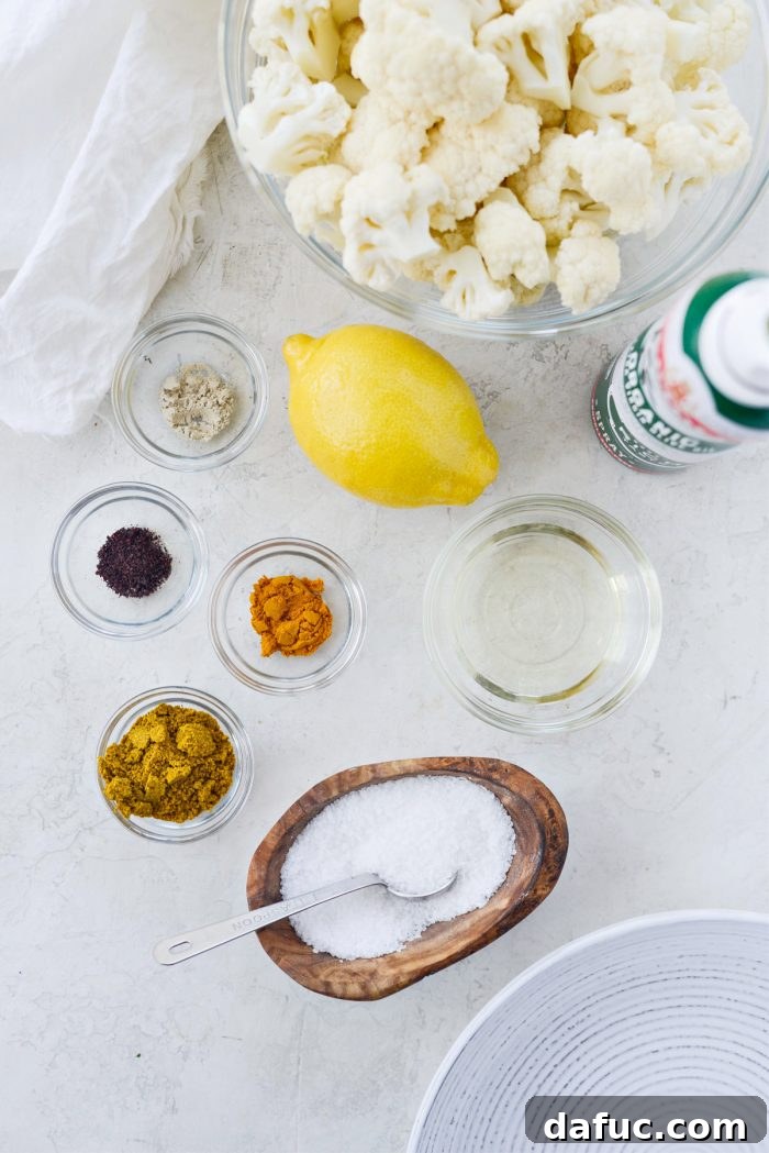 Golden Curry Roasted Cauliflower 4 Curry Roasted Cauliflower ingredients laid out