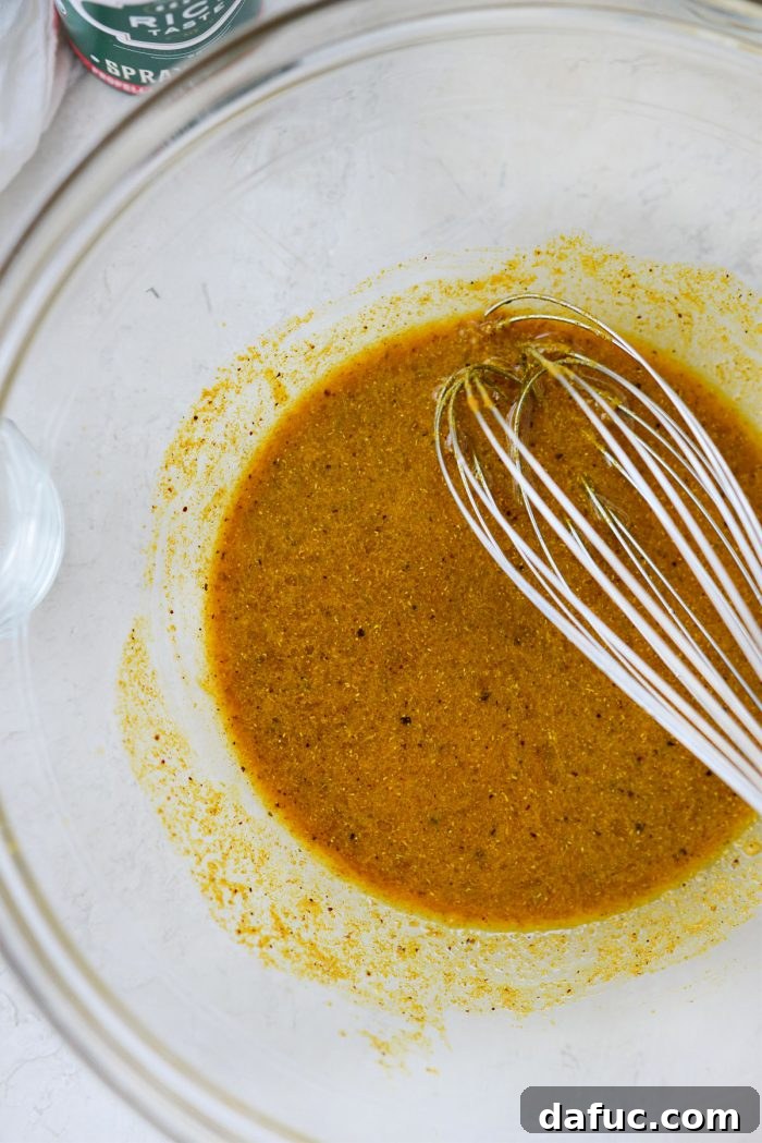 Golden Curry Roasted Cauliflower 5 Curry sauce being whisked together in a bowl