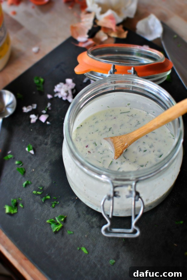 Effortless Summer Salad with Creamy Buttermilk Dressing 9 Stirring homemade buttermilk dressing until smooth