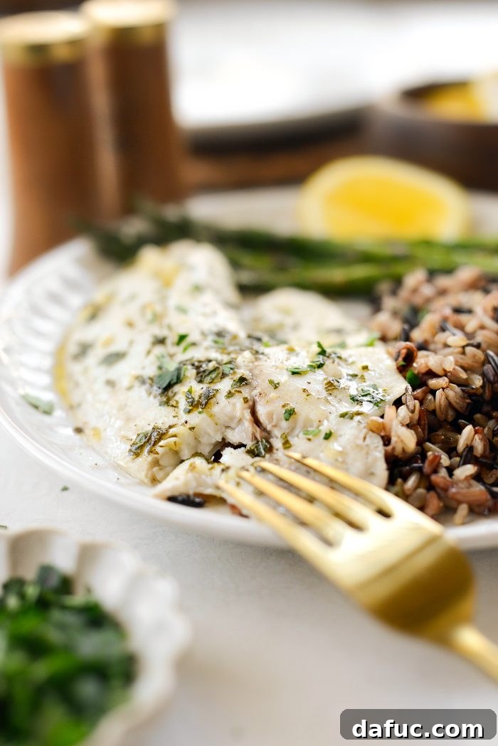 Final plated image of Sheet Pan Lemon Garlic Tilapia with Asparagus