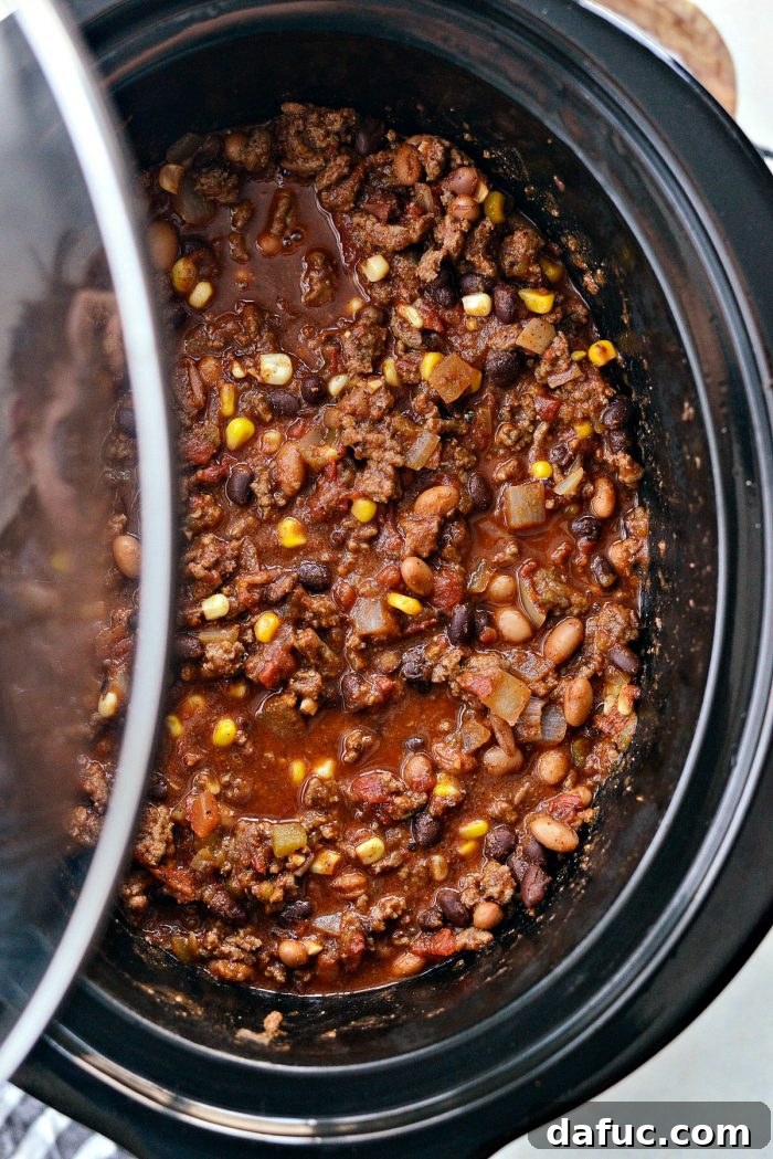 Fiesta Slow Cooker Taco Chili 11 Alternative method: Slow Cooker Taco Chili simmering in a Dutch oven on the stovetop, demonstrating its versatility beyond just a crock pot.