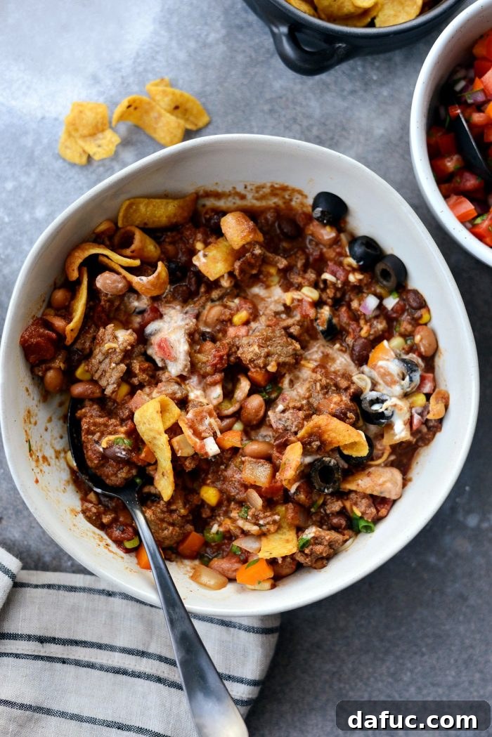 Fiesta Slow Cooker Taco Chili 19 A final close-up image of the Slow Cooker Taco Chili, perfectly plated with all the delicious toppings, emphasizing its appetizing appeal.