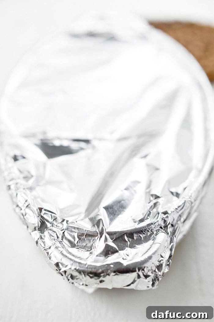 Sweet Mexican Cornbread 11 The baking dish with corn cake batter tightly covered with aluminum foil