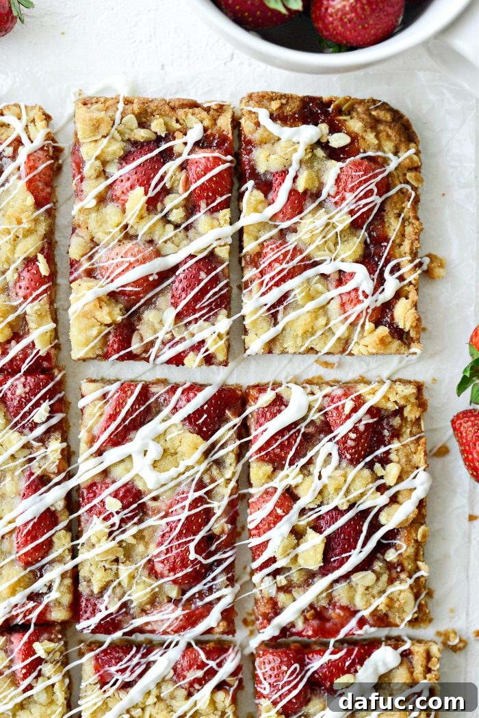 Strawberry Streusel Bars arranged beautifully on a serving plate
