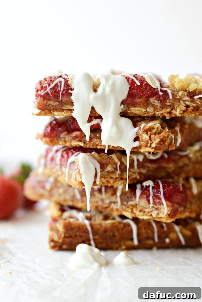 Final presentation of Strawberry Streusel Bars with a rustic background