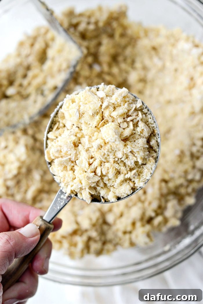 Reserving one cup of the streusel mixture for topping