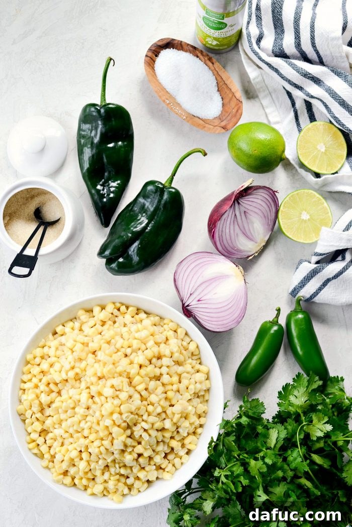 Chipotle's Signature Sweet Corn Salsa 4 A beautifully presented bowl of homemade Chipotle Sweet Corn Salsa, garnished with fresh cilantro, positioned next to a stack of golden, crispy tortilla chips on a textured background. The image emphasizes the freshness and deliciousness of the salsa.