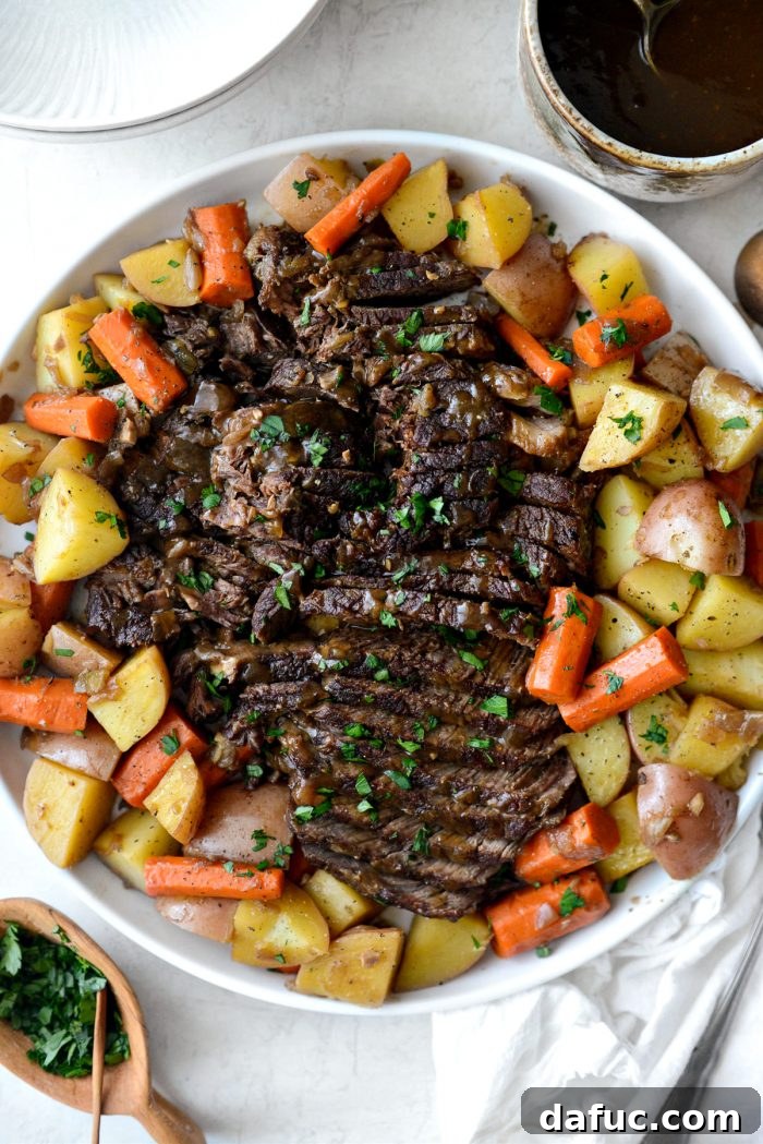 Hearty Homestyle Beef Pot Roast 2 Classic Beef Pot Roast served with warm bread