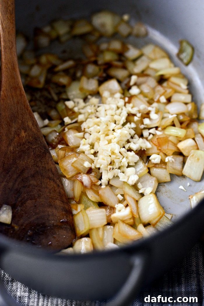 Hearty Homestyle Beef Pot Roast 10 Sautéed onions with minced garlic in the pot.