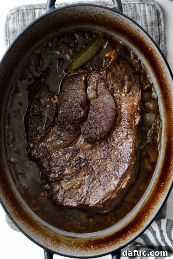 Hearty Homestyle Beef Pot Roast 14 Potatoes and carrots added to the slow-cooked pot roast.