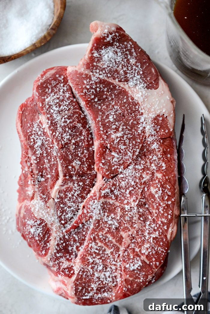 Hearty Homestyle Beef Pot Roast 6 Seasoning the beef chuck roast with kosher salt