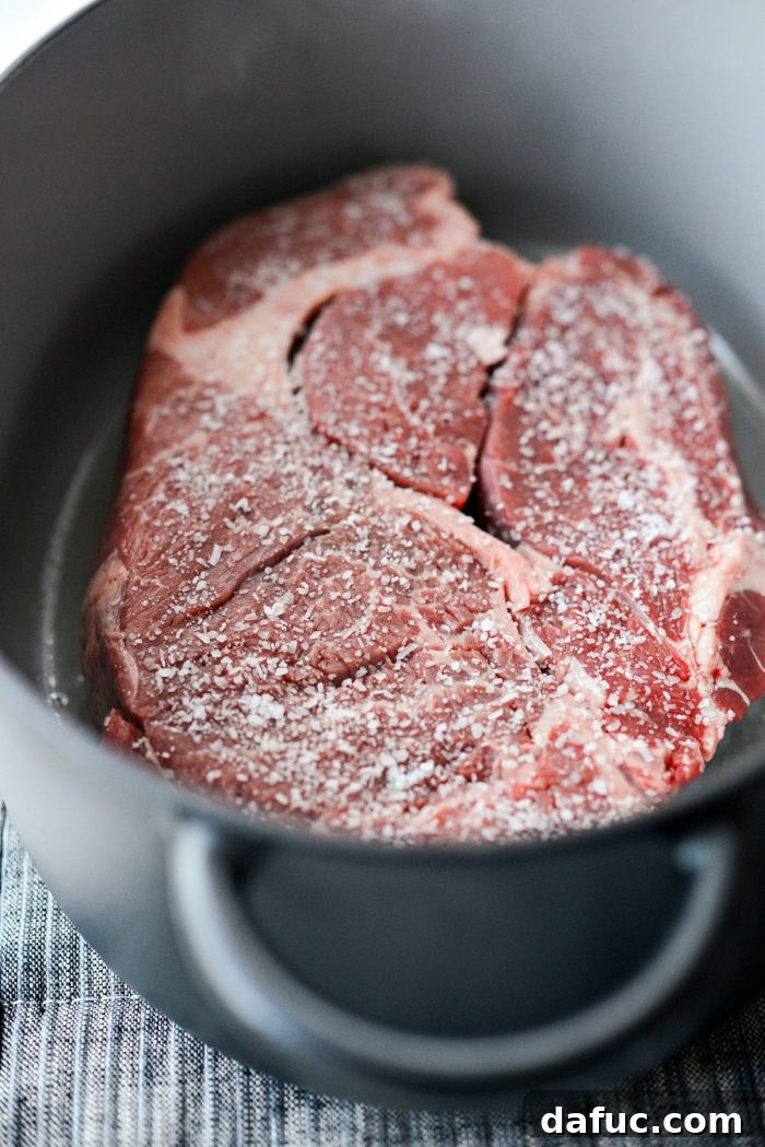 Hearty Homestyle Beef Pot Roast 7 Searing the beef chuck roast in a Dutch oven