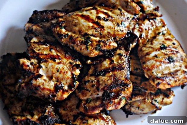 Brew-Soaked Chicken Thighs 2 Delicious Beer Marinated Chicken Thighs on a serving platter