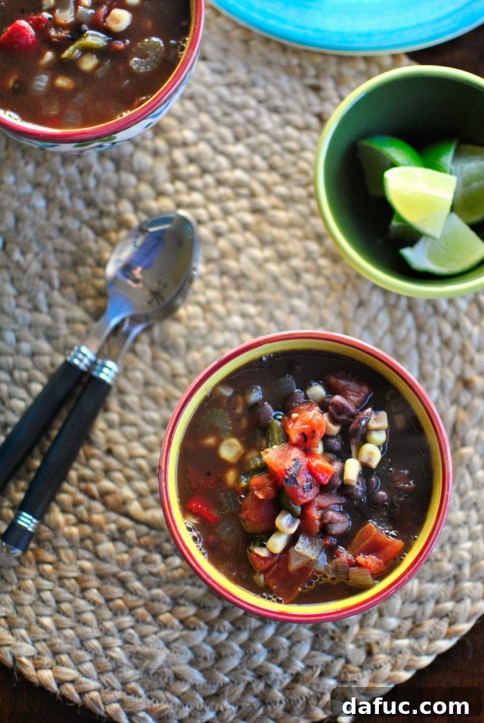 Rich and vibrant Black Bean and Corn Soup, ready to be served