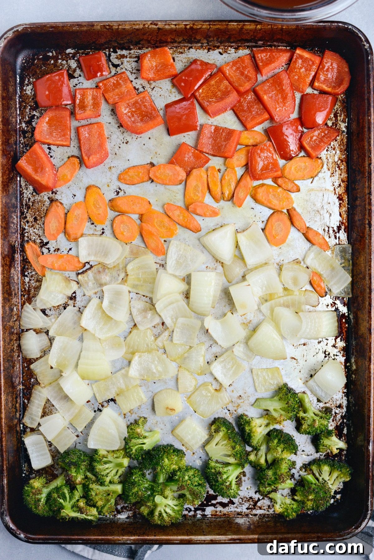 chopped red bell pepper, slice carrots, chopped onions and broccoli florets roasted