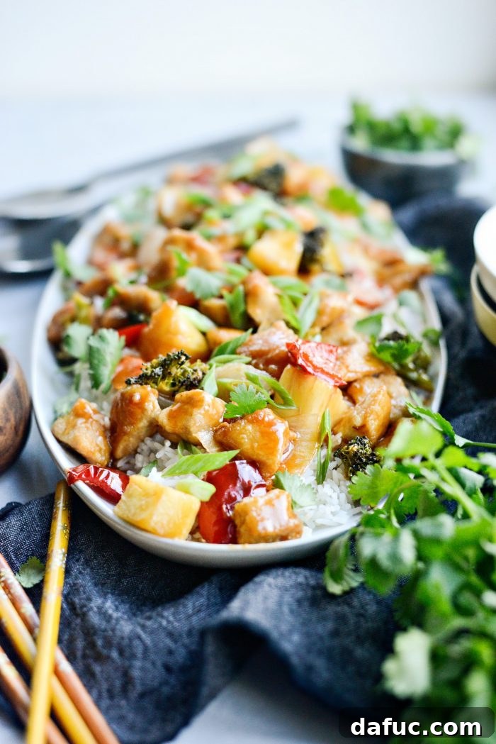 Close up of saucy Homemade Sweet and Sour Chicken.