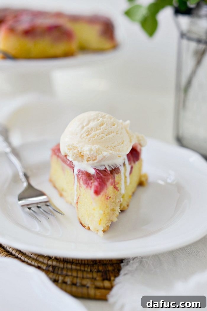 Martha Sweet Rhubarb Flip 29 A slice of Martha's Rhubarb Upside Down Cake topped with a scoop of creamy vanilla ice cream