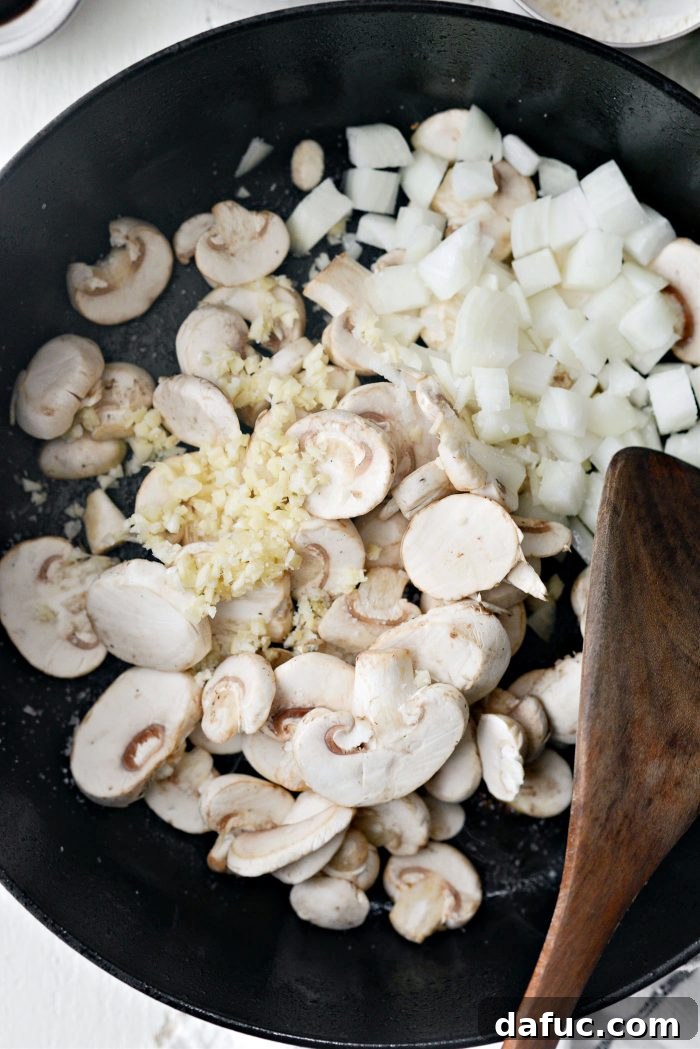 Hearty Homestyle Beef Stroganoff 13 Sliced mushrooms, diced onion, and minced garlic added to the skillet