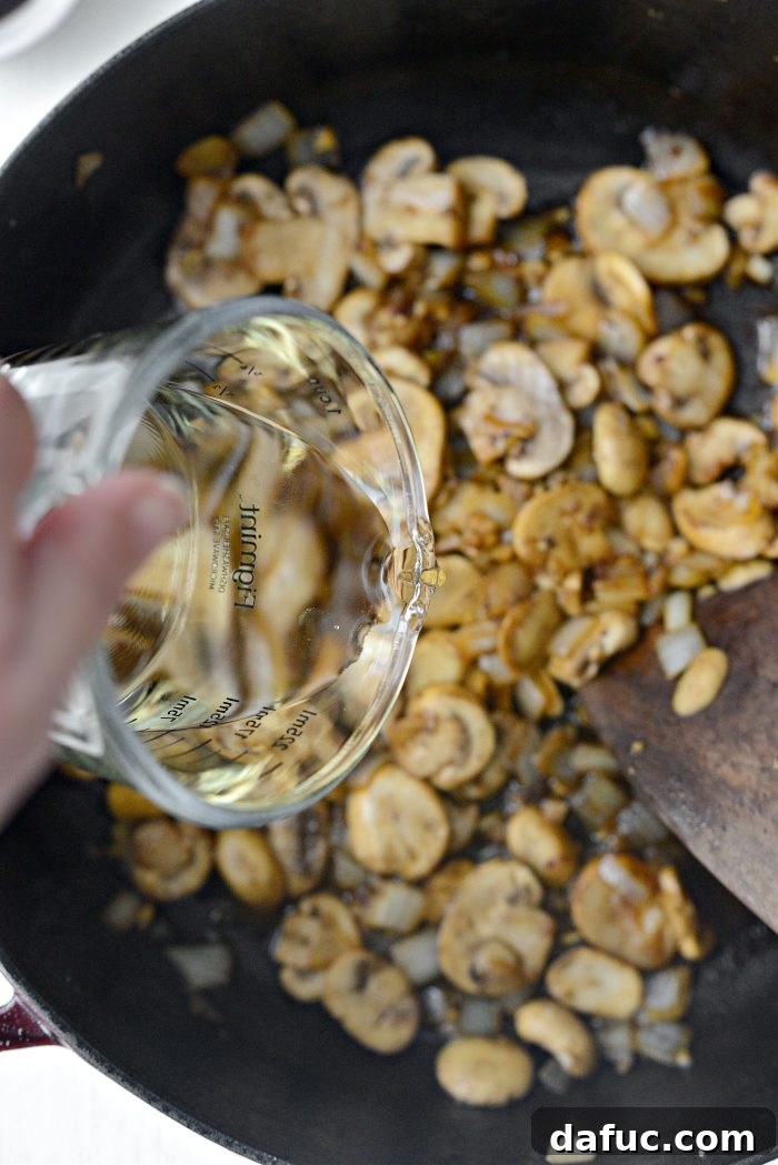 Hearty Homestyle Beef Stroganoff 15 Dry white wine poured into the skillet to deglaze