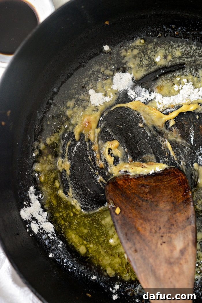 Hearty Homestyle Beef Stroganoff 20 Stirring and cooking the roux for 2 minutes