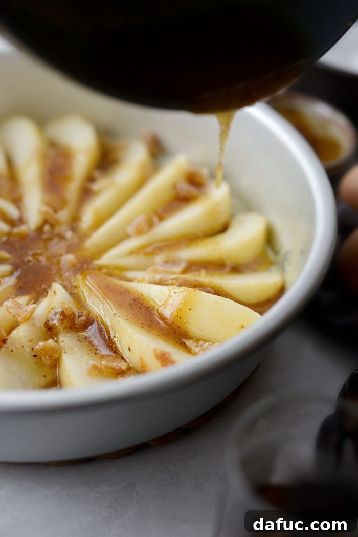Caramelized Ginger Pear Invert 11 Pouring bourbon brown butter mixture over pears and candied ginger