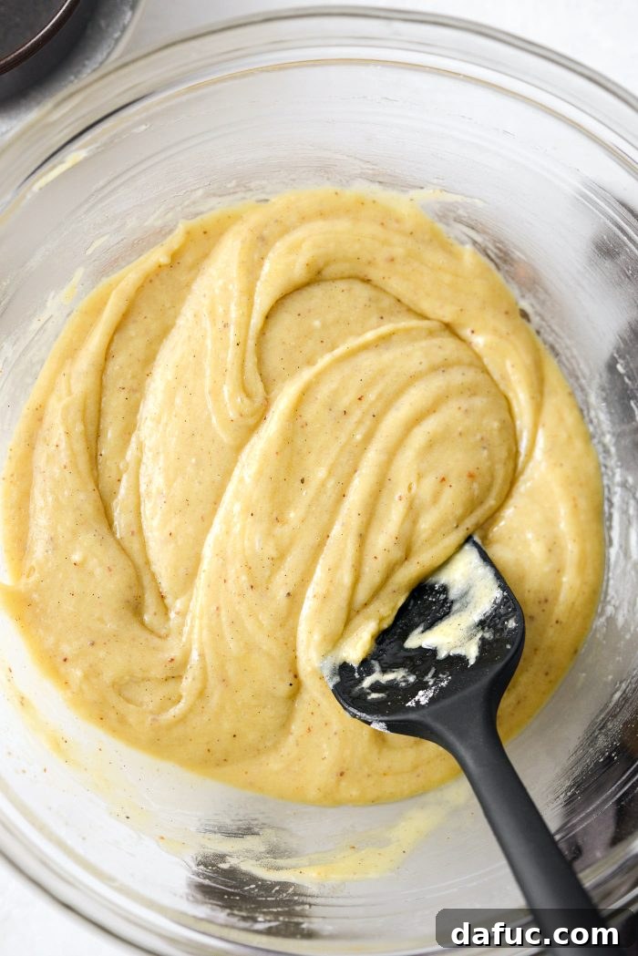 Caramelized Ginger Pear Invert 19 Stirring brown butter into the cake batter