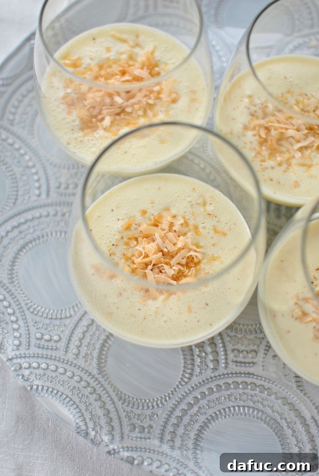 Coconut Cream Caribbean Nog 3 Beautifully garnished Spiked Coconut Eggnog