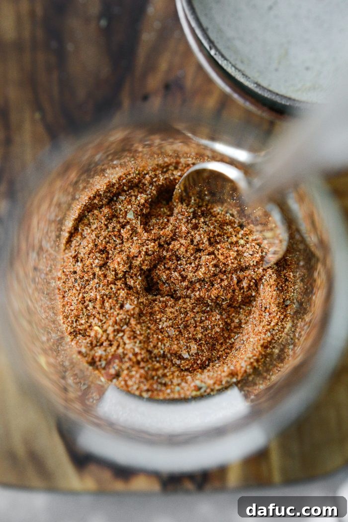 Ingredients for making homemade taco seasoning laid out on a surface