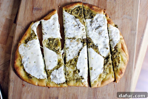Delicious Pesto Tomato Naan Personal Pizza