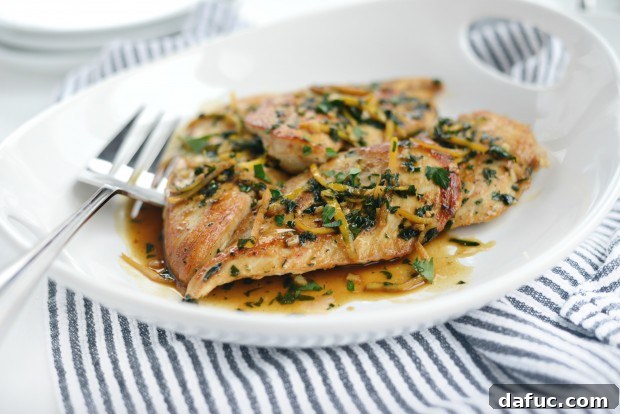 Golden Pan Seared Chicken with Bright Lemon Herb Sauce 2 seared chicken breast with lemon herb pan sauce l SimplyScratch.com