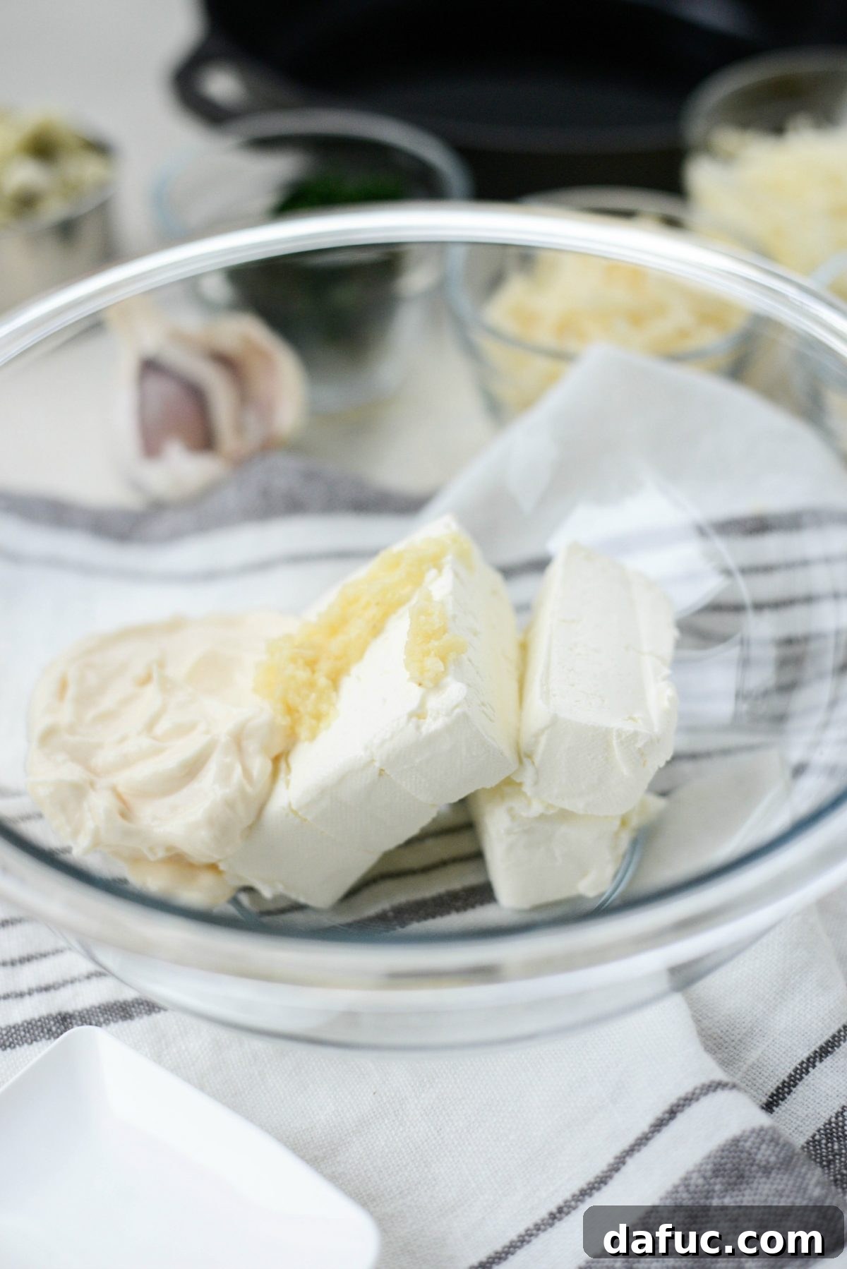 cream cheese, mayo and garlic in bowl.