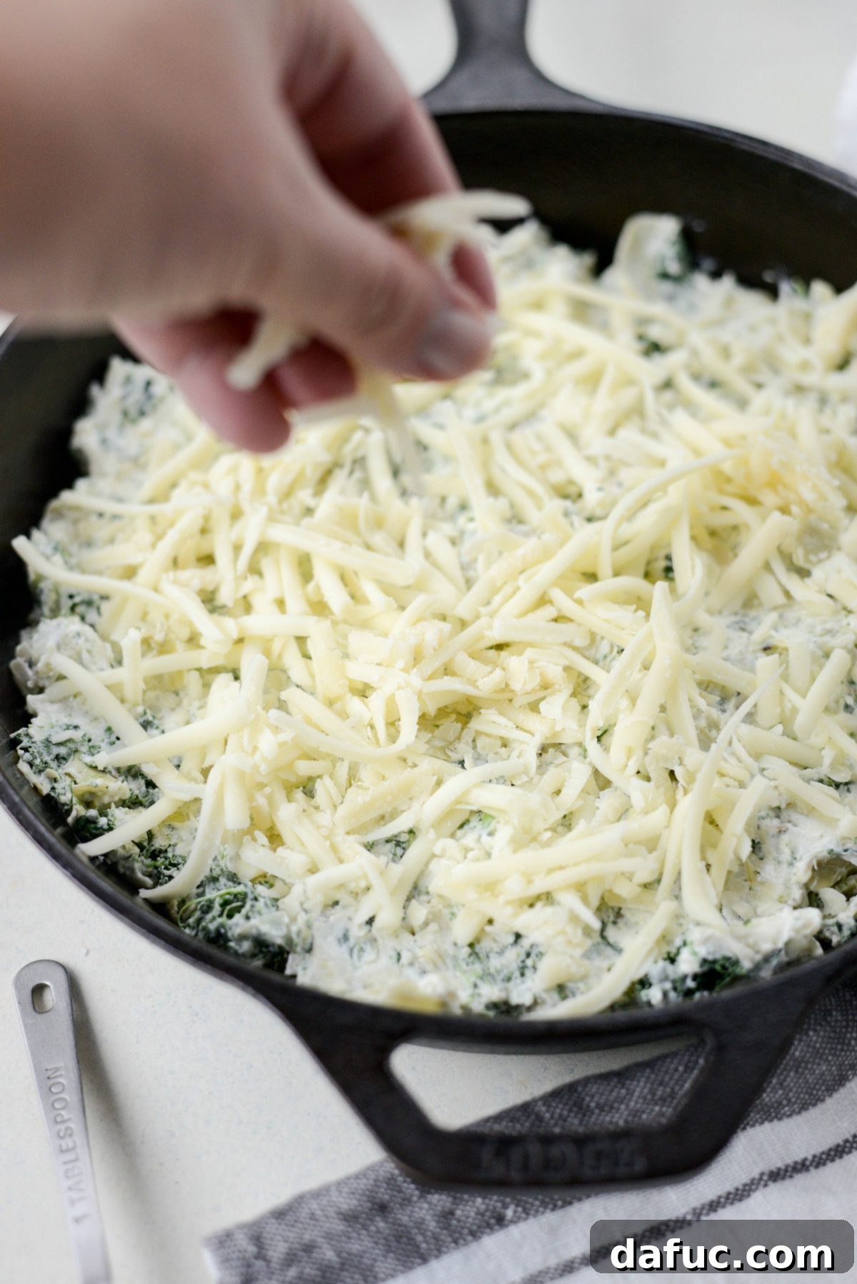 Top with more cheese.