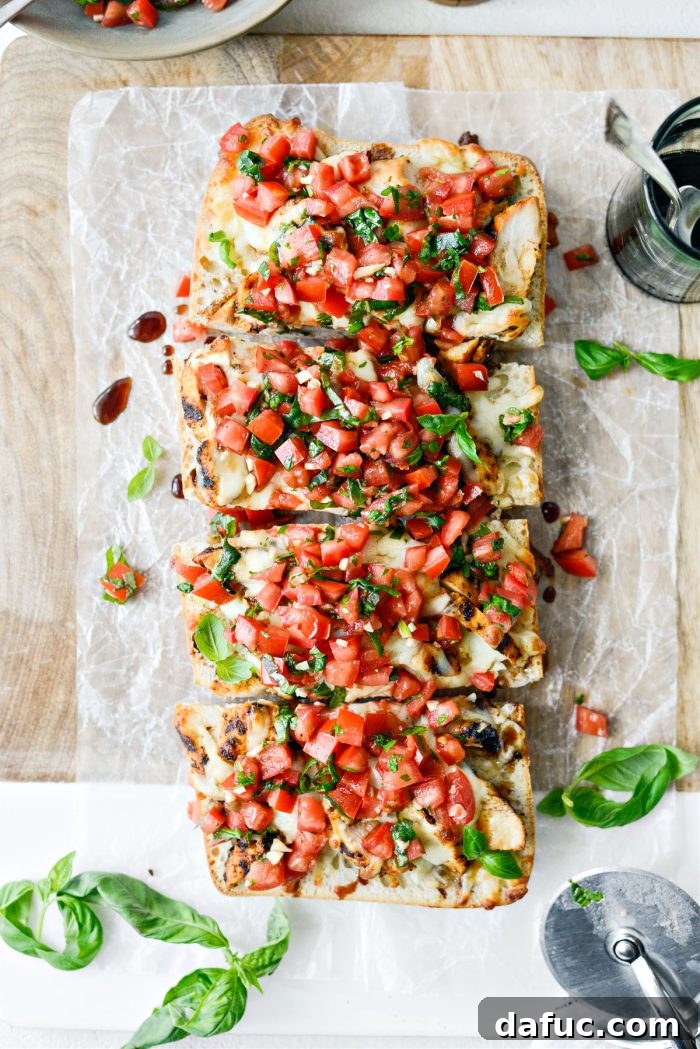 Vibrant Bruschetta Chicken Pizza 15 Finished Grilled Chicken Bruschetta Pizza garnished with balsamic glaze and basil, ready to be cut