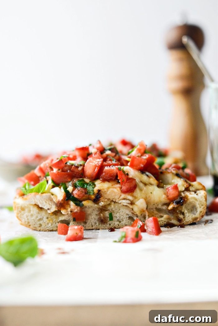 Vibrant Bruschetta Chicken Pizza 19 Close-up of a beautifully plated slice of grilled chicken bruschetta pizza