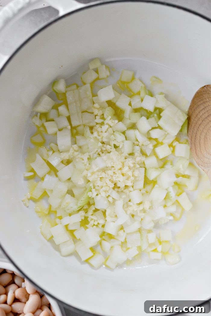 Velvety White Chicken Chili 5 saute onions and garlic in olive oil