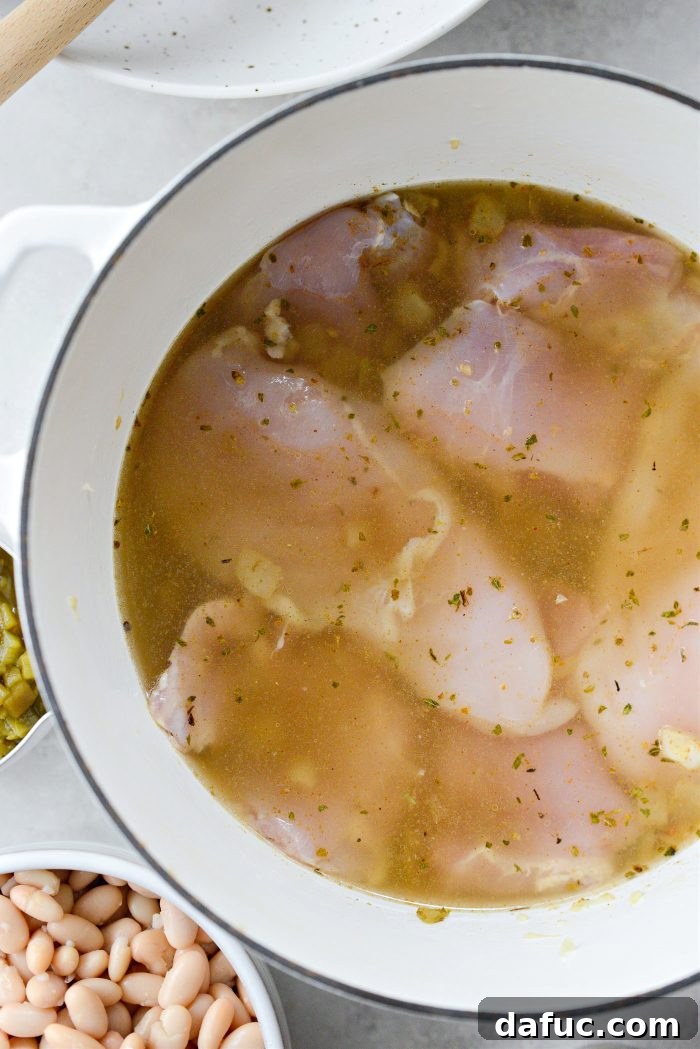 Velvety White Chicken Chili 10 poach the chicken for 30 minutes
