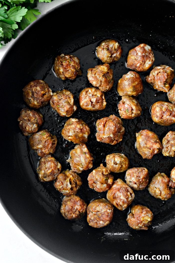 add Italian sausage to bacon fat and a little olive oil